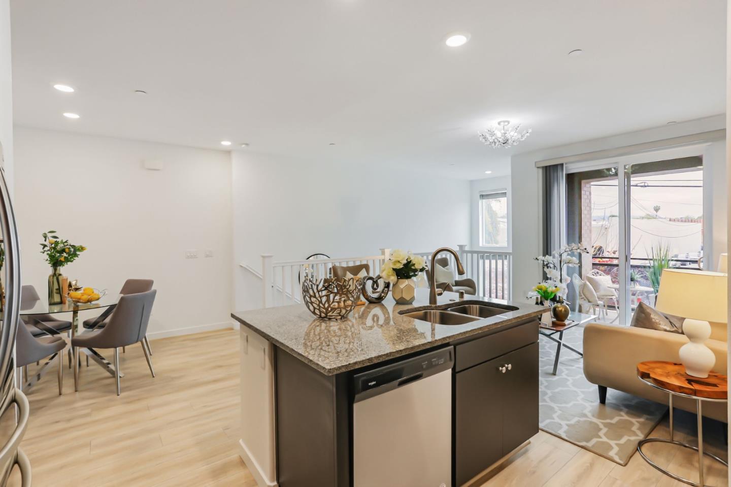 1883 Dobbin Drive San Jose, CA 95133 - Photo 10 of 27 a view of a kitchen area with furniture and wooden floor