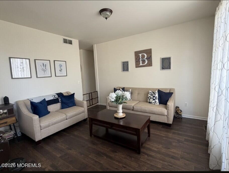 381 Leeward Road Manahawkin, NJ 08050 - Photo 11 of 17 a living room with furniture and a wooden floor