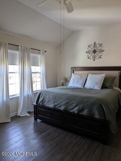 381 Leeward Road Manahawkin, NJ 08050 - Photo 16 of 17 a bedroom with a bed and wooden floor