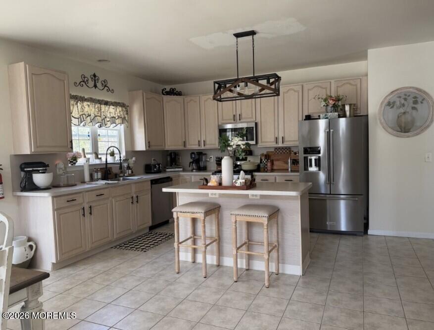 381 Leeward Road Manahawkin, NJ 08050 - Photo 4 of 17 a kitchen with stainless steel appliances granite countertop a sink a stove a refrigerator and cabinets