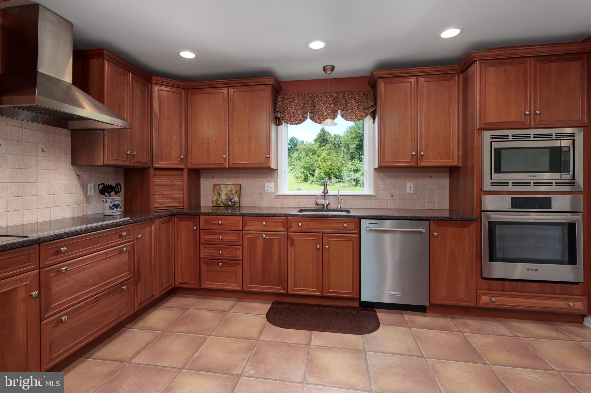 56 Valley Road Lambertville, NJ 08530 - Photo 26 of 49 a kitchen with stainless steel appliances granite countertop a stove sink and cabinets
