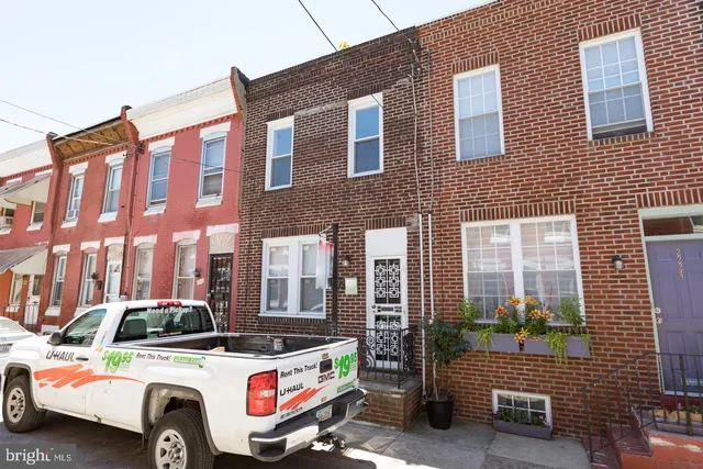 a view of a car park in front of a building