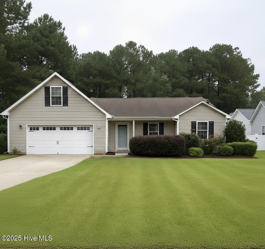 131 Marcil Lane Hampstead, NC 28443 - Photo 2 of 17 Inviting front porch and large front yard.