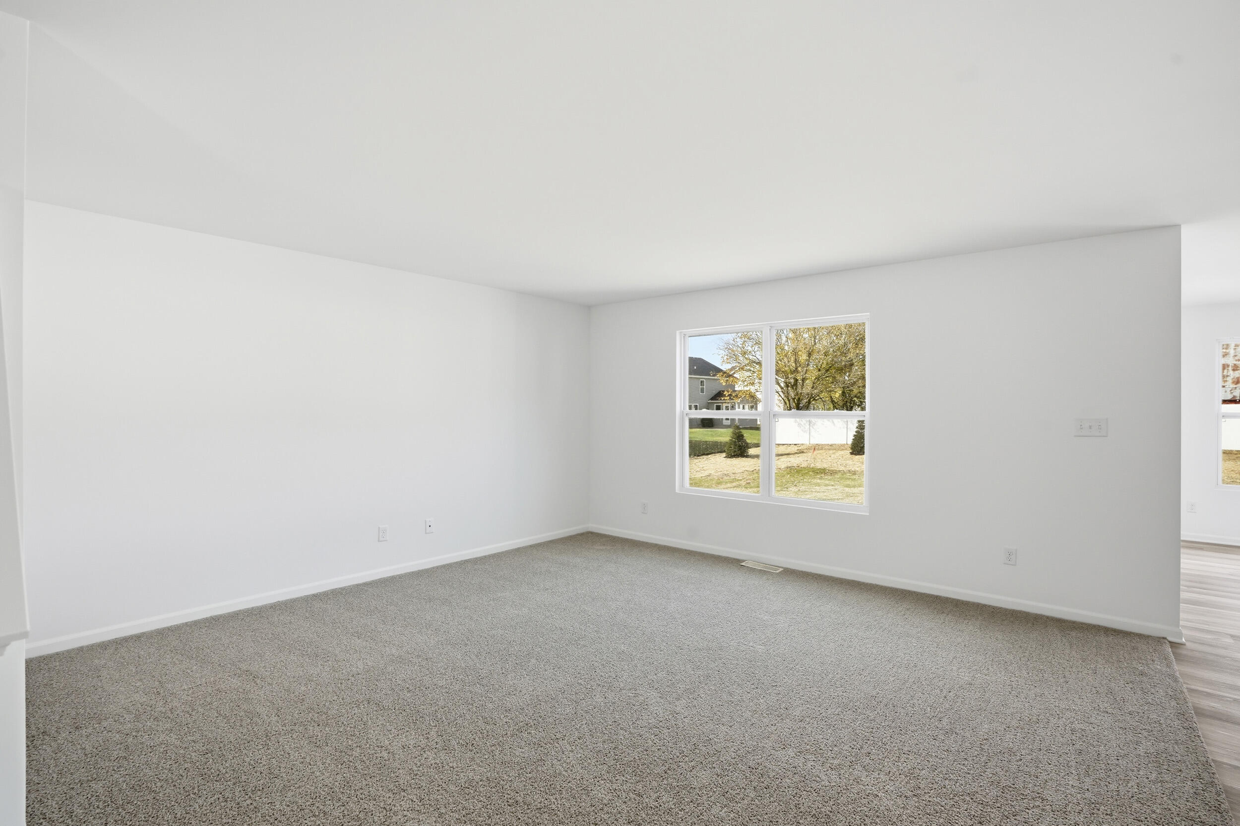 10392 Knox Street Crown Point, IN 46307 - Photo 10 of 31 an empty room with windows