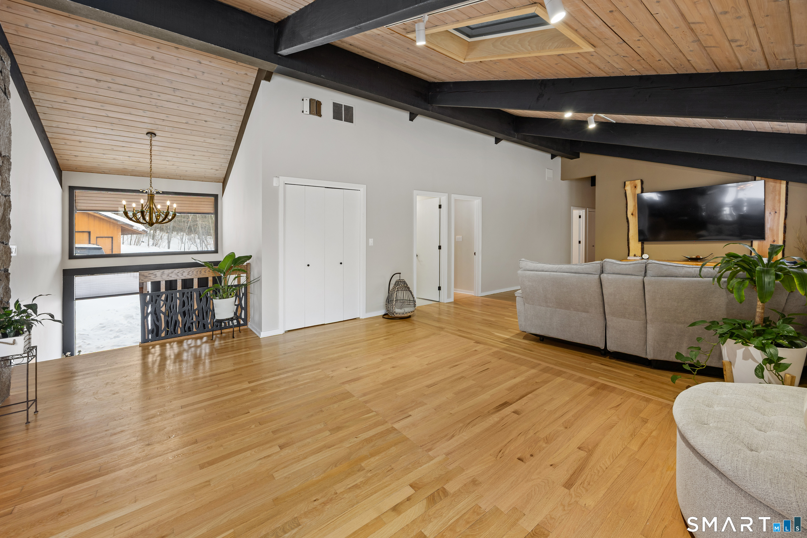 305 Westledge Drive Torrington, CT 06790 - Photo 12 of 37 a living room with furniture and a flat screen tv