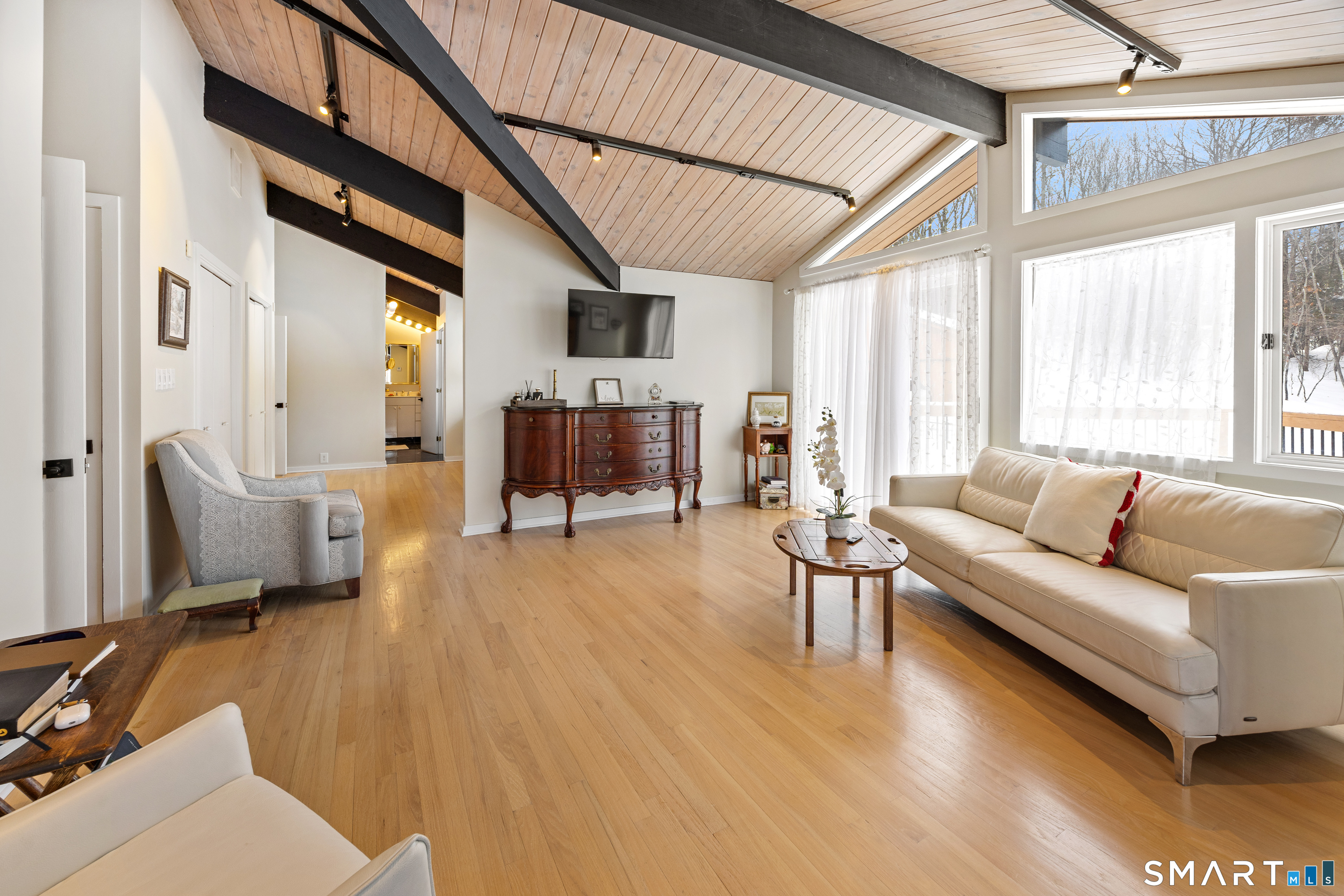 305 Westledge Drive Torrington, CT 06790 - Photo 19 of 37 a living room with furniture and a large window
