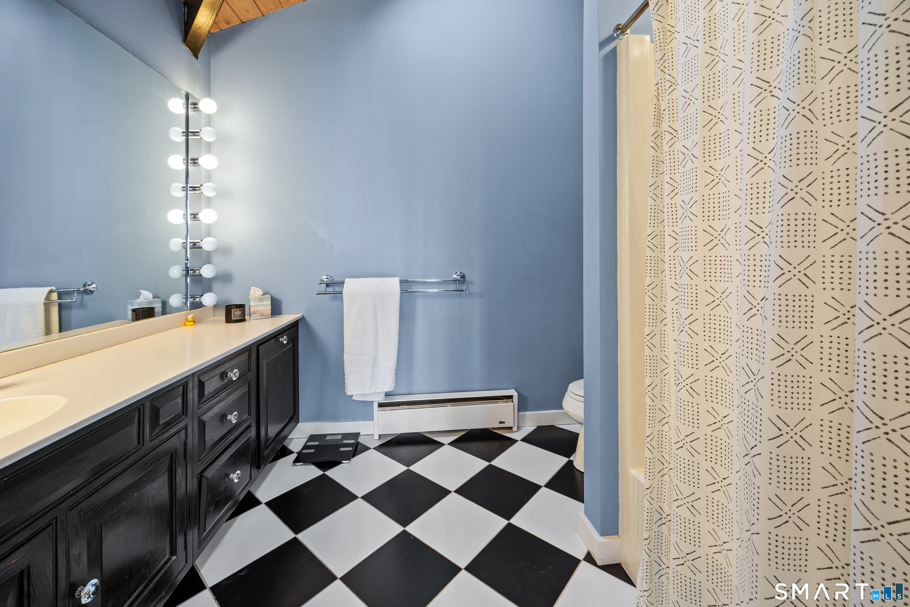 305 Westledge Drive Torrington, CT 06790 - Photo 23 of 37 a bathroom with a double vanity sink and mirror