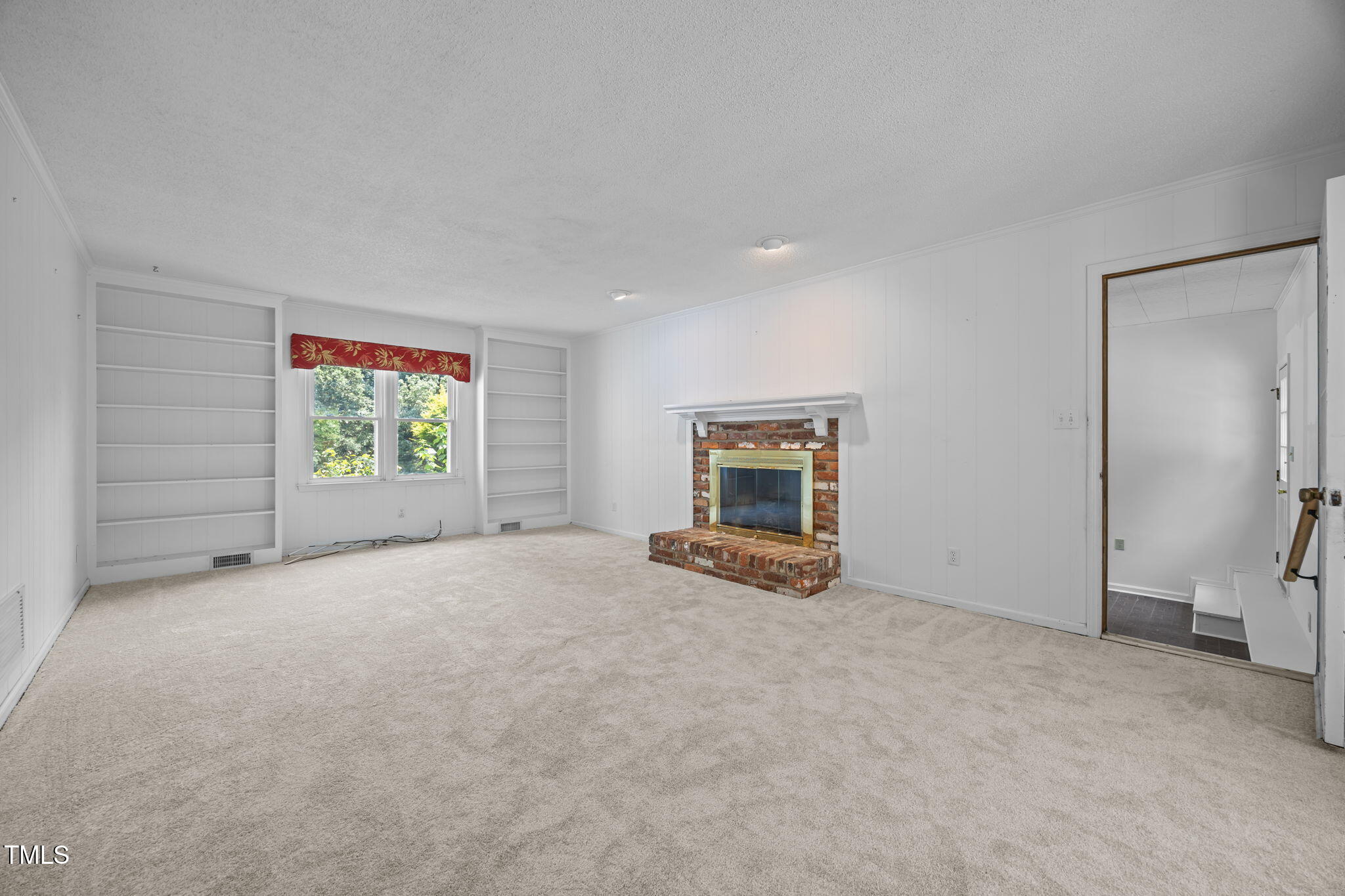 8909 Creekstone Court, Unit 11 Raleigh, NC 27615 - Photo 15 of 39 an empty room with windows