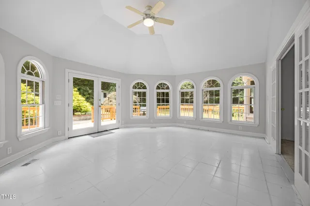 an empty room with windows