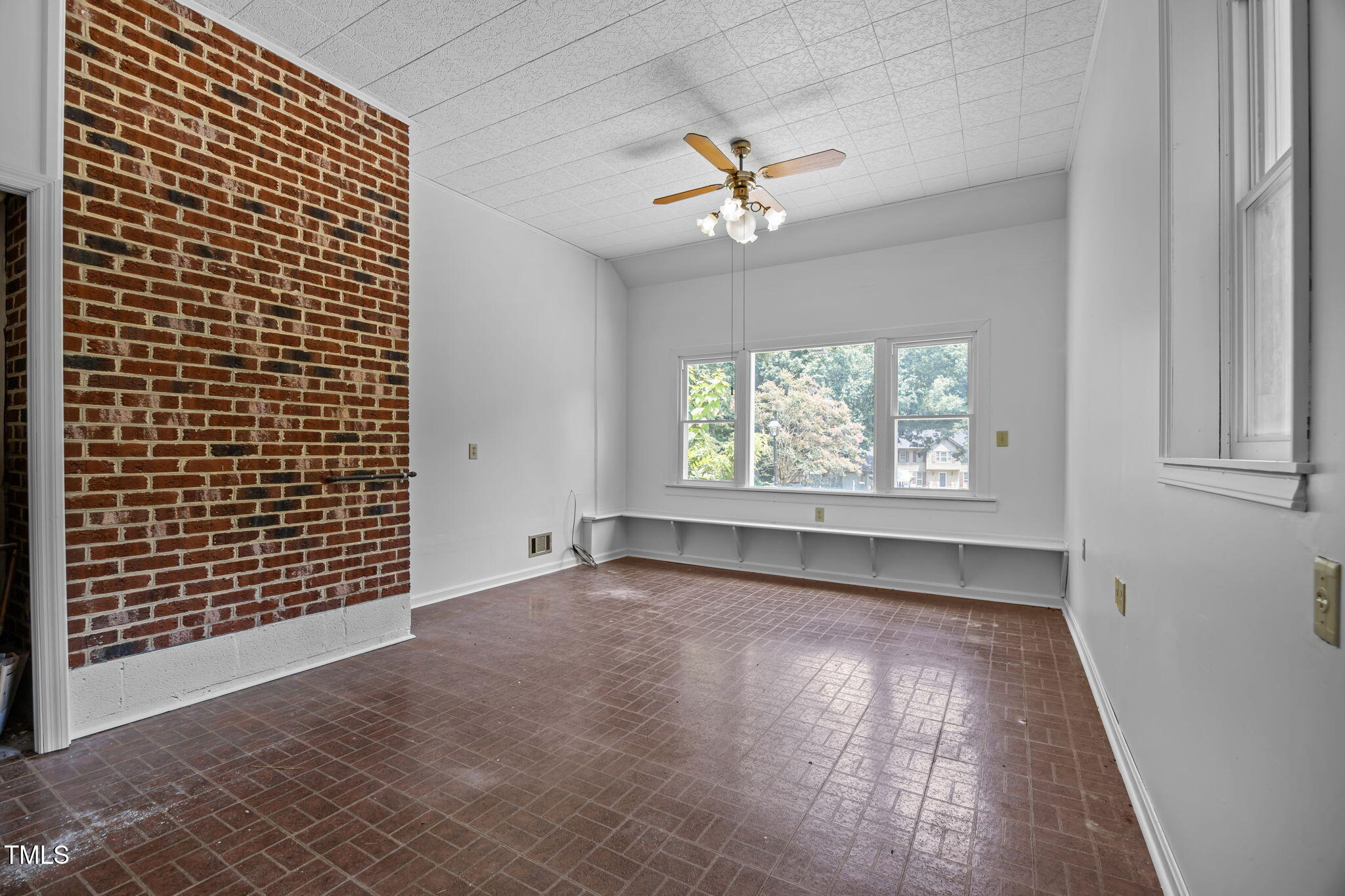 8909 Creekstone Court, Unit 11 Raleigh, NC 27615 - Photo 19 of 39 a view of an empty room with a window