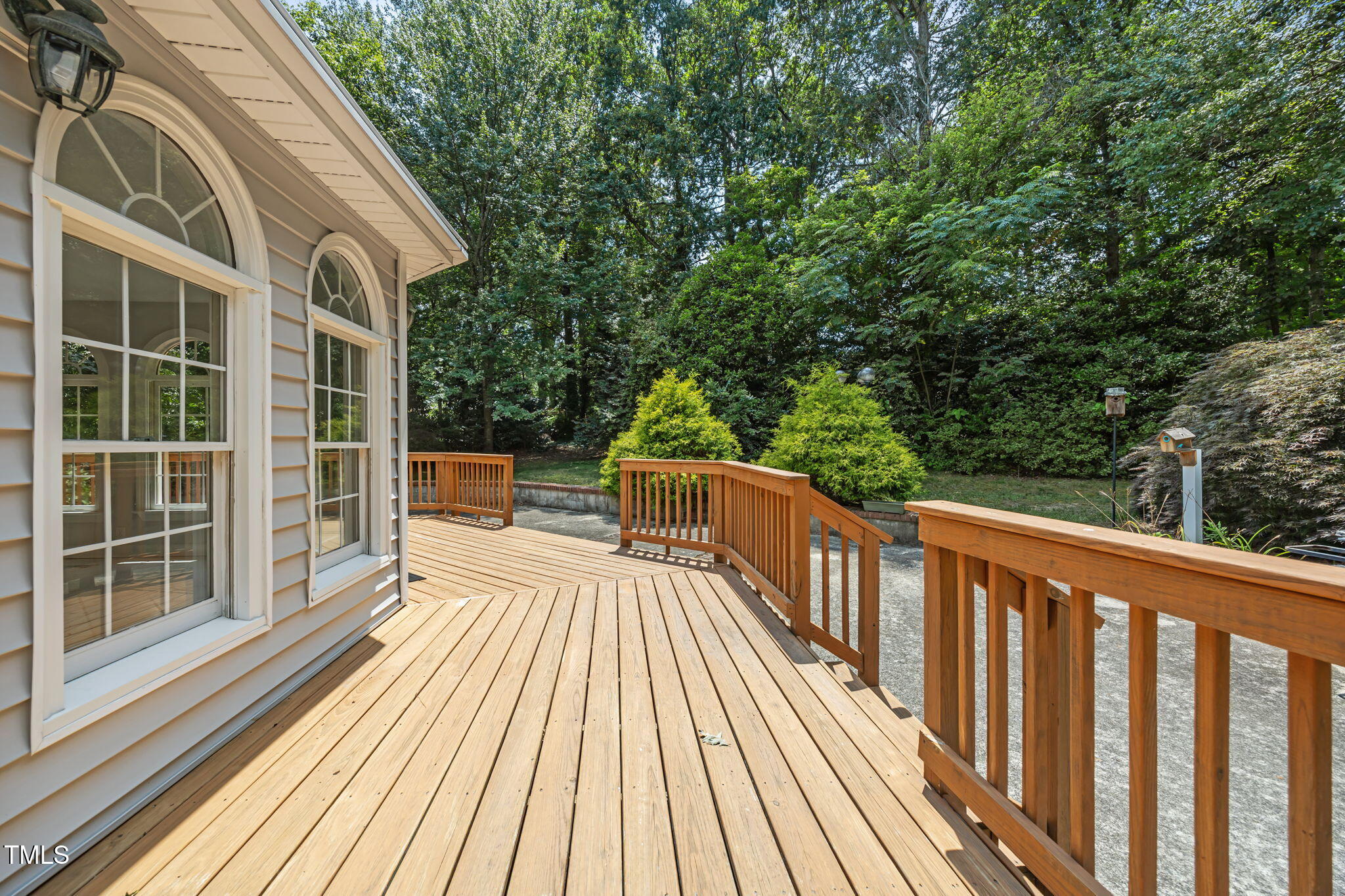 8909 Creekstone Court, Unit 11 Raleigh, NC 27615 - Photo 31 of 39 a view of balcony with wooden floor and fence