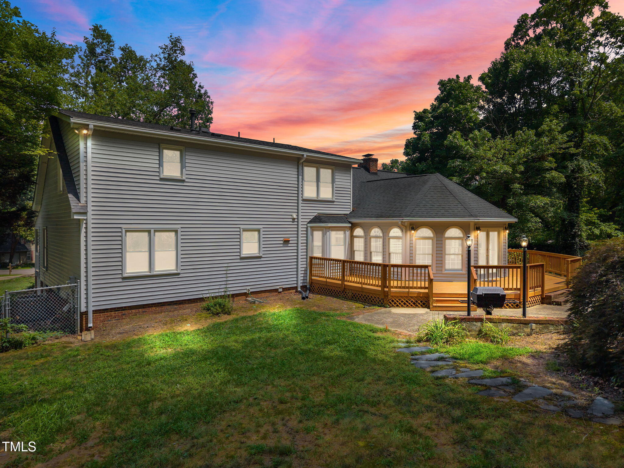 8909 Creekstone Court, Unit 11 Raleigh, NC 27615 - Photo 35 of 39 a view of a house with a yard