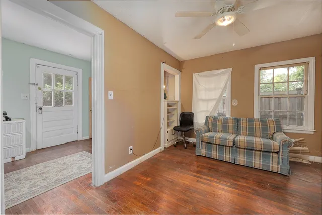 a bedroom with a bed and furniture