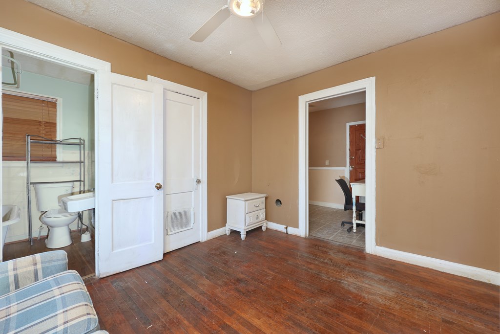1641 16th Avenue Columbus, GA 31901 - Photo 12 of 76 a bedroom with a bed and furniture