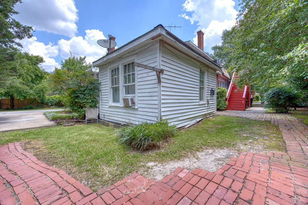 1641 16th Avenue Columbus, GA 31901 - Photo 18 of 76 a front view of a house with garden