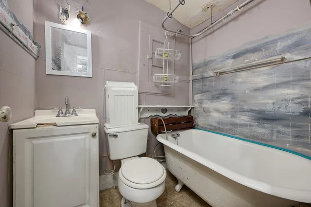 a kitchen with a stove and a refrigerator