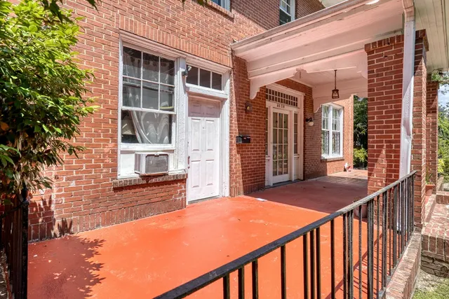 a bathroom with a sink a toilet and vanity