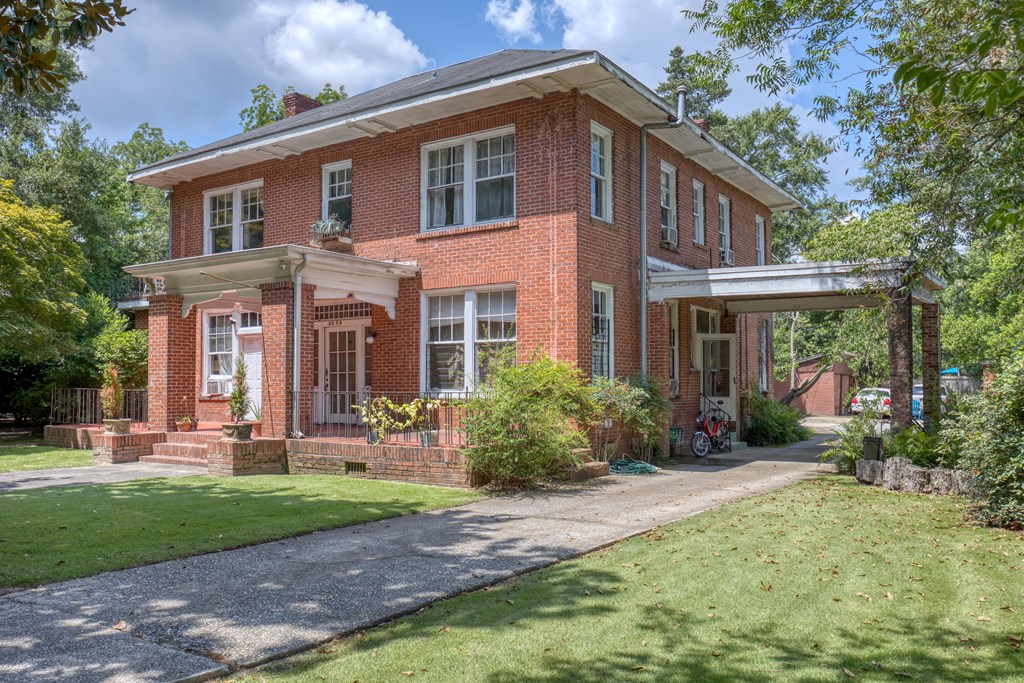 1641 16th Avenue Columbus, GA 31901 - Photo 42 of 76 a front view of a house with garden and porch