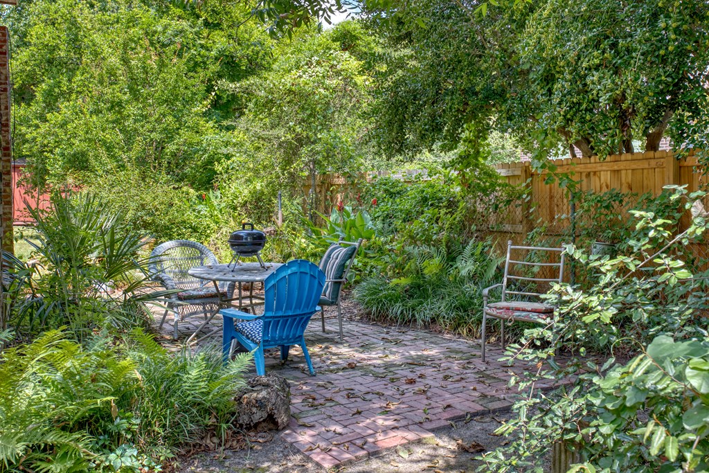 1641 16th Avenue Columbus, GA 31901 - Photo 44 of 76 a view of a chair and table in the garden