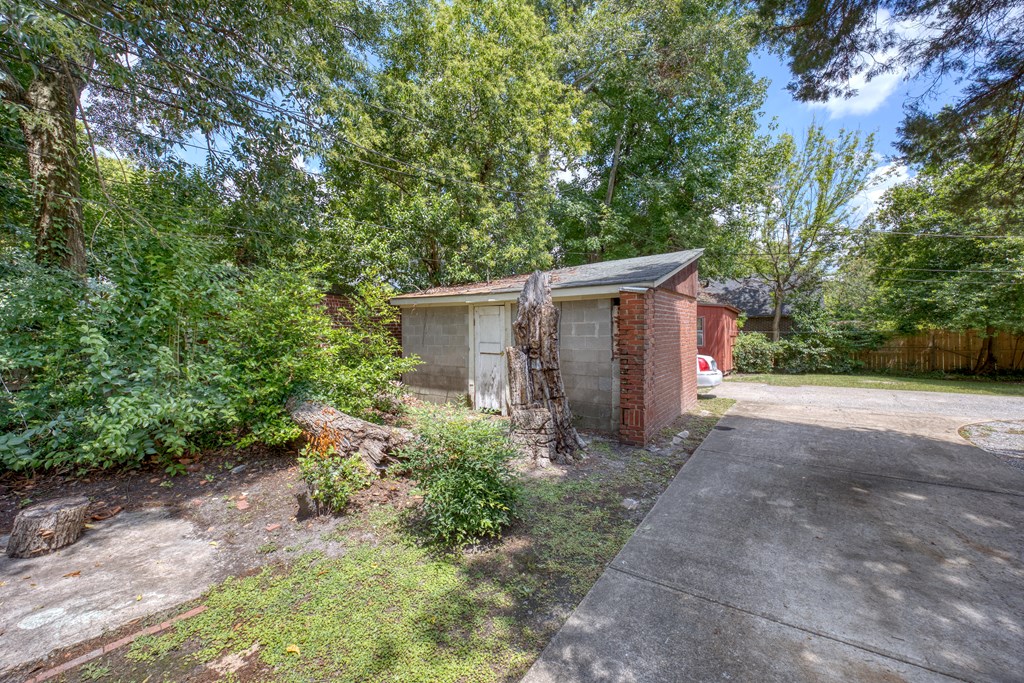 1641 16th Avenue Columbus, GA 31901 - Photo 53 of 76 a view of a house with backyard and trees