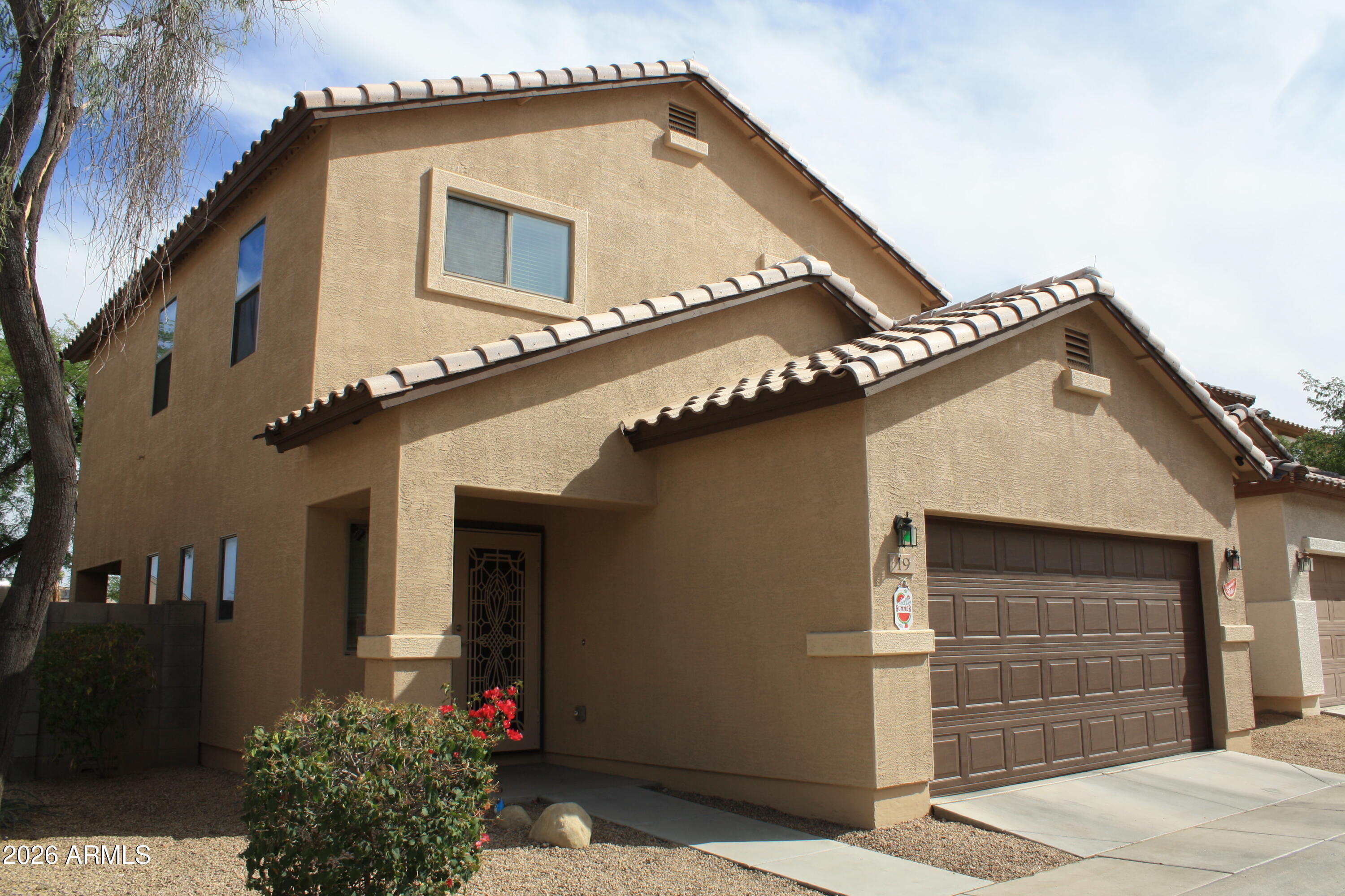10225 West Camelback Road, Unit 19 Phoenix, AZ 85037 - Photo 1 of 51 a front view of a house
