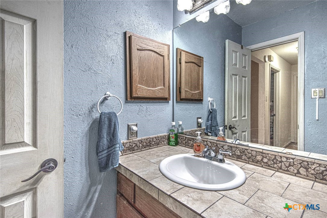 4802 Stone Ridge Drive Temple, TX 76502 - Photo 21 of 27 BUILT IN MEDICINE CABINET