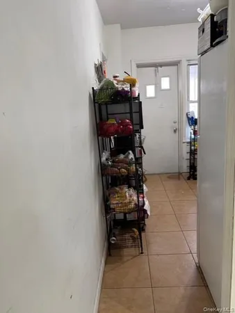 a room with furniture and gym equipment