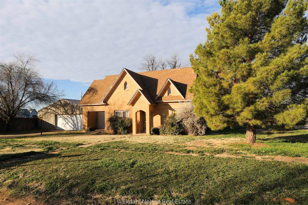 a front view of house with yard