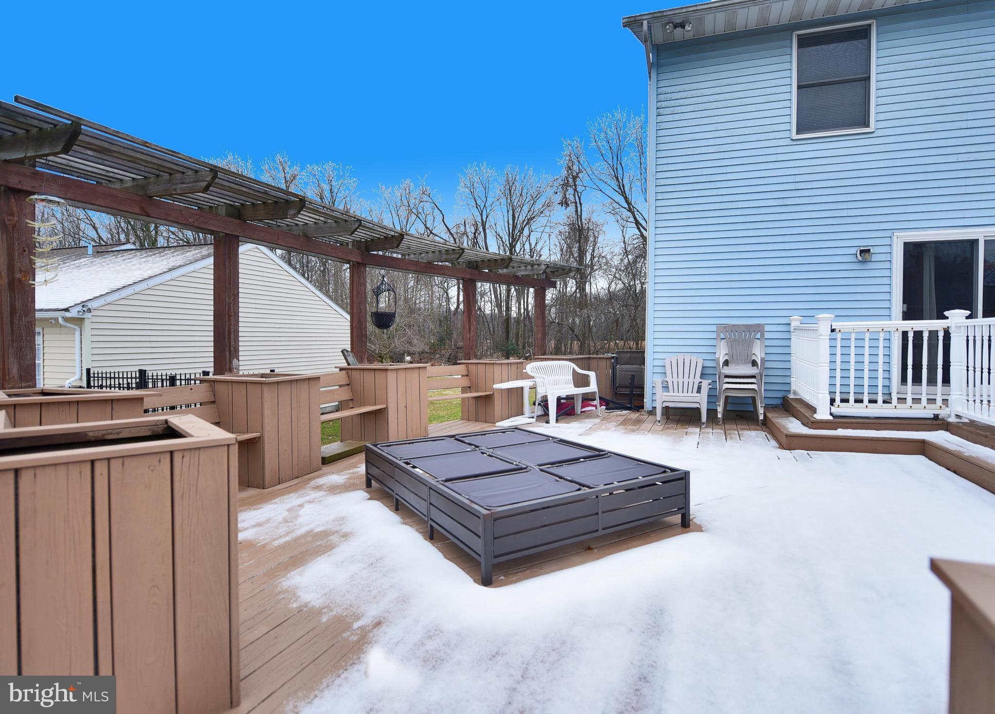 7242 Oliver Beach Road Baltimore, MD 21220 - Photo 9 of 30 Tiered deck with built in storage and landscaping