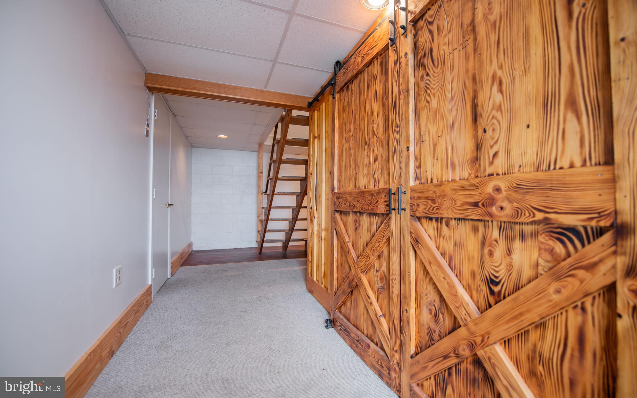 507 Grape Street Lock Haven, PA 17745 - Photo 17 of 26 a view of a room with wooden walls
