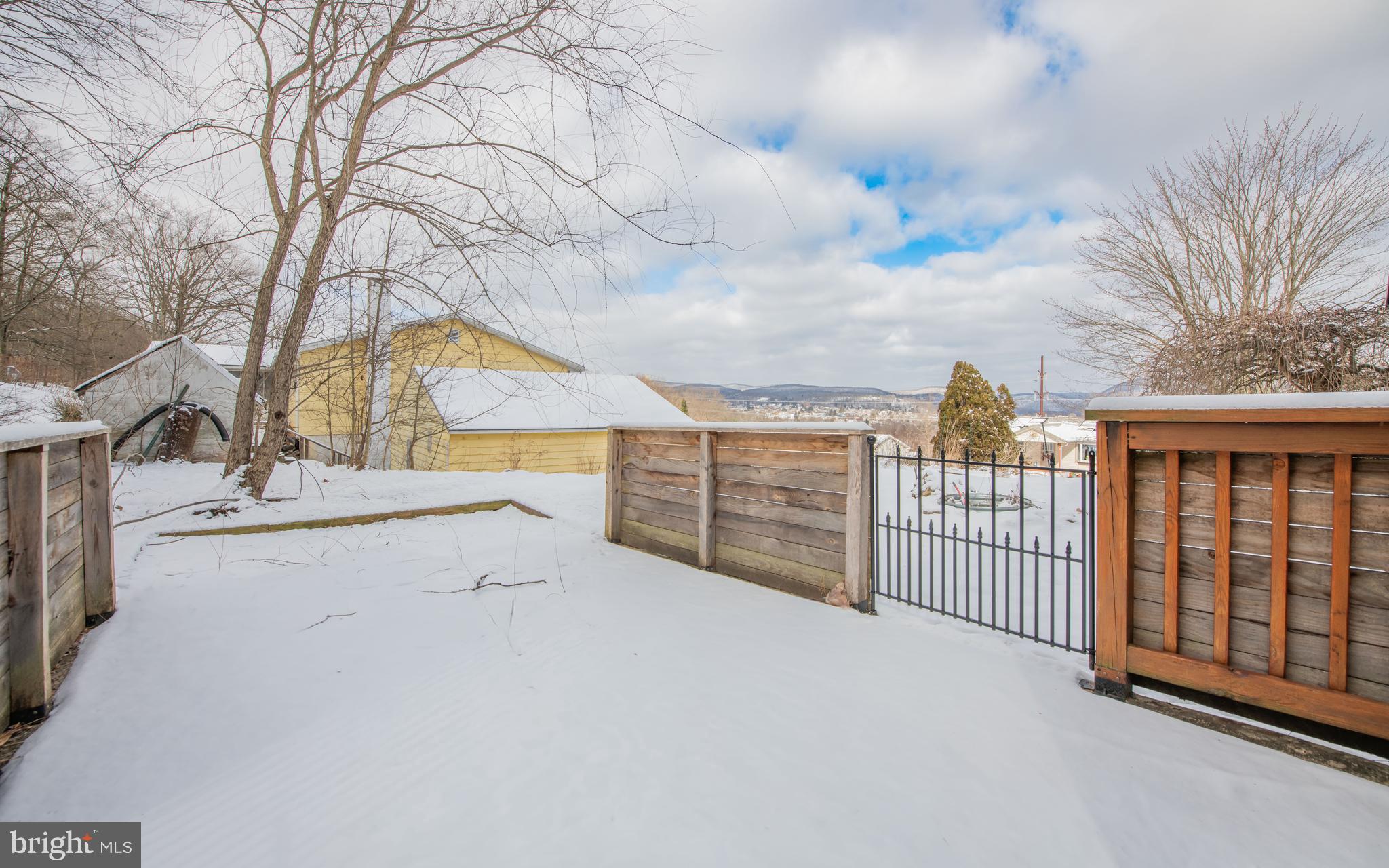 507 Grape Street Lock Haven, PA 17745 - Photo 20 of 26 a view of terrace with wooden fence