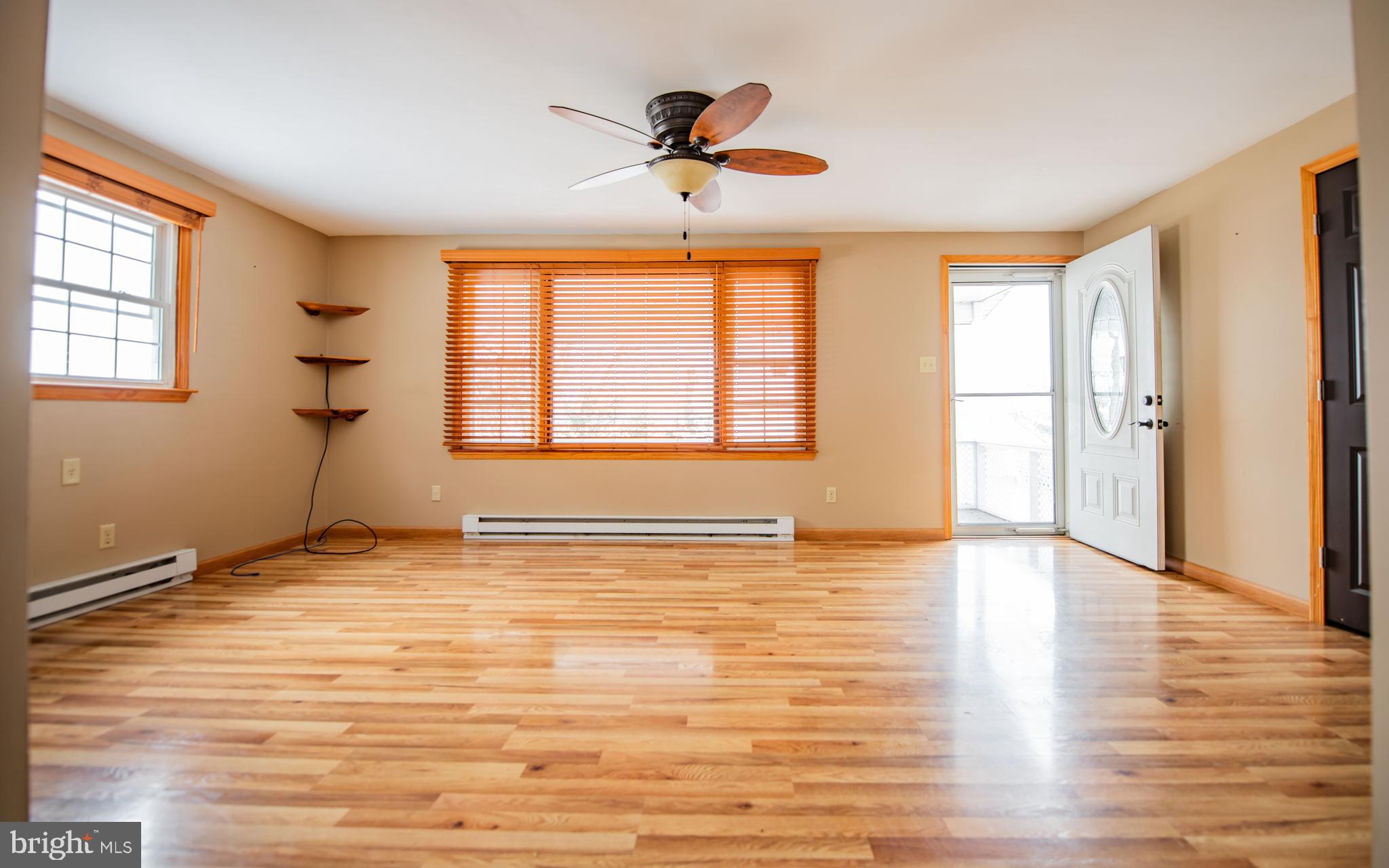 507 Grape Street Lock Haven, PA 17745 - Photo 2 of 26 a view of an empty room with a window