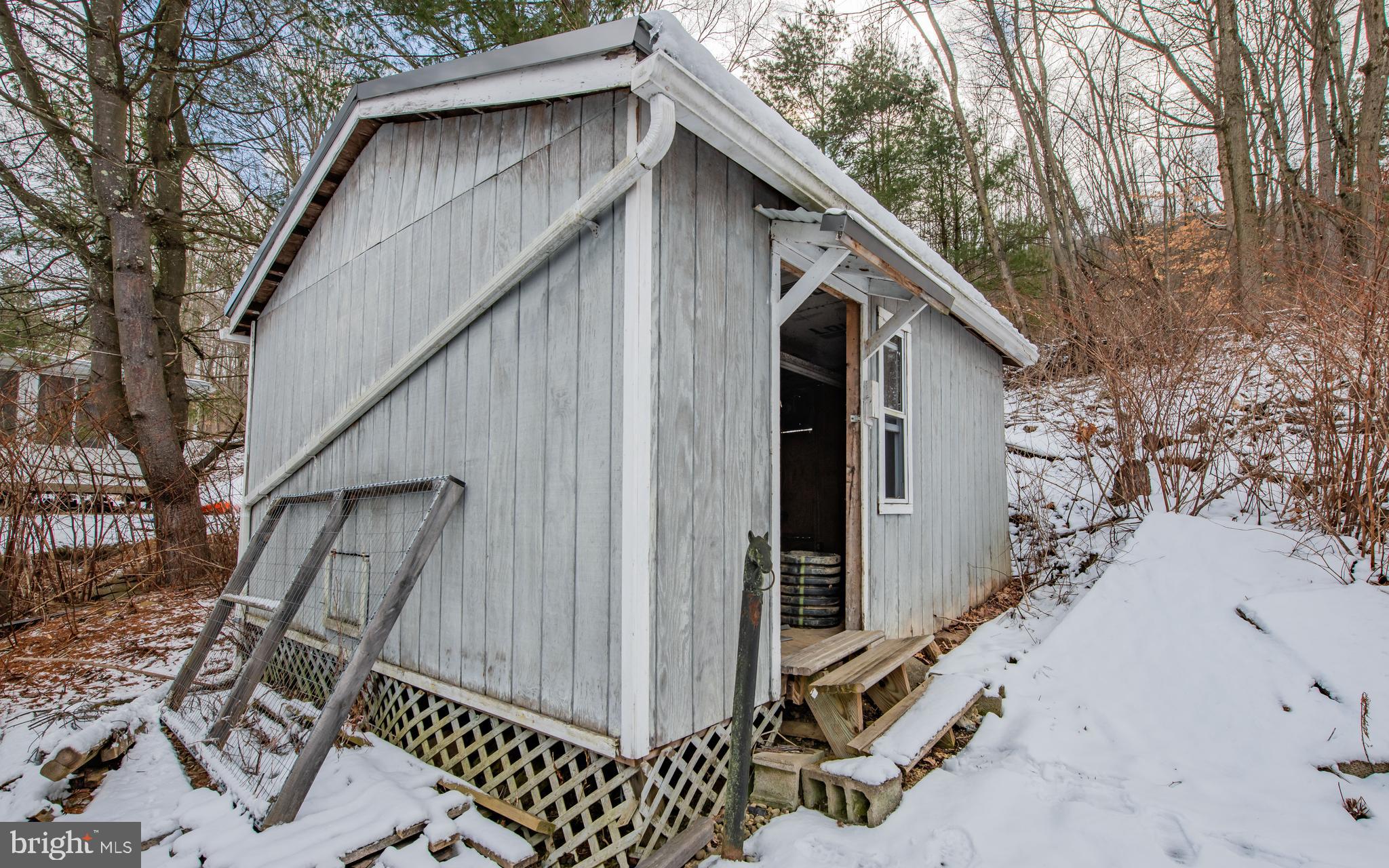 507 Grape Street Lock Haven, PA 17745 - Photo 26 of 26 a backyard of a house with table and chairs