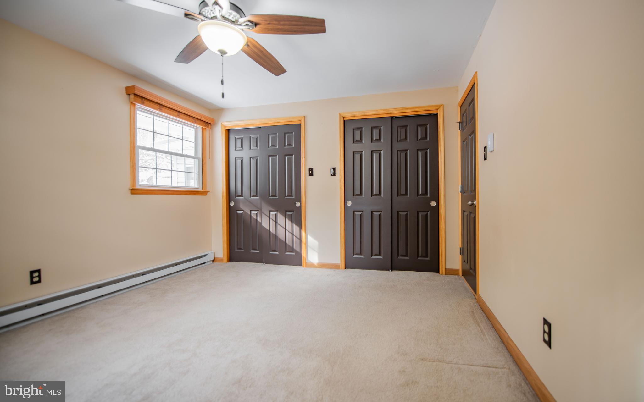 507 Grape Street Lock Haven, PA 17745 - Photo 9 of 26 a view of a livingroom with a chandelier fan and a window