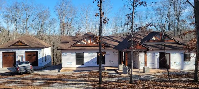 a patio with a table and chairs
