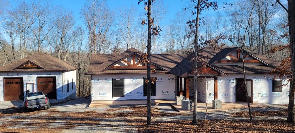147 Dunrobin Court Sparta, TN 38583 - Photo 1 of 2 a patio with a table and chairs