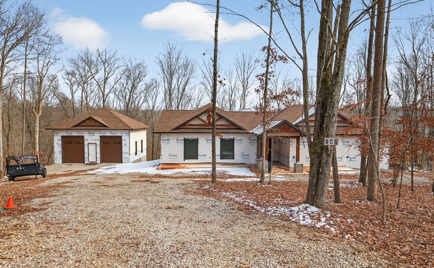 147 Dunrobin Court Sparta, TN 38583 - Photo 2 of 59 a front view of a house with a yard