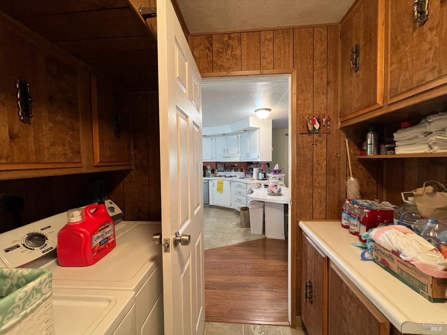 161 Bear Flag Road Sonoma, CA 95476 - Photo 15 of 57 a kitchen with a sink stove and cabinets