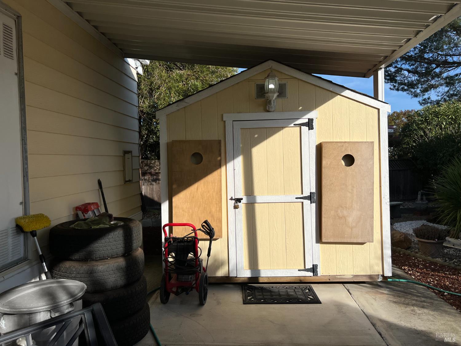 161 Bear Flag Road Sonoma, CA 95476 - Photo 26 of 57 a roof deck with table and chairs and potted plants