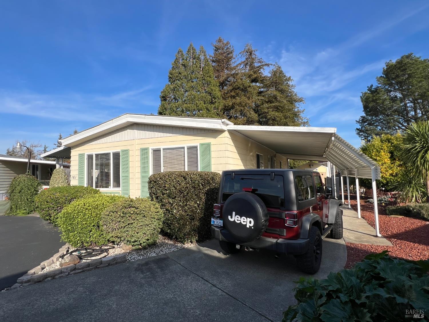 161 Bear Flag Road Sonoma, CA 95476 - Photo 27 of 57 a car parked in front of a house