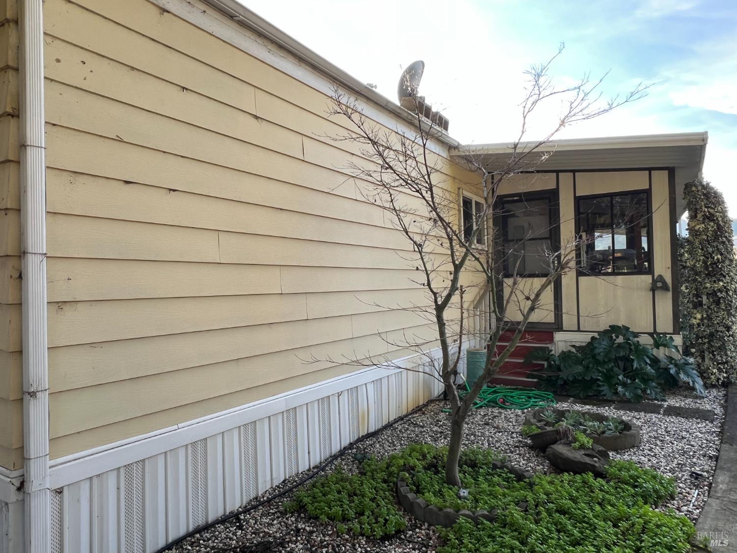 161 Bear Flag Road Sonoma, CA 95476 - Photo 30 of 57 a view of a house with a wooden fence
