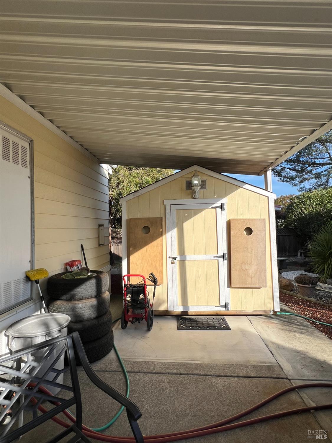 161 Bear Flag Road Sonoma, CA 95476 - Photo 34 of 57 a backyard of a house with table and chairs