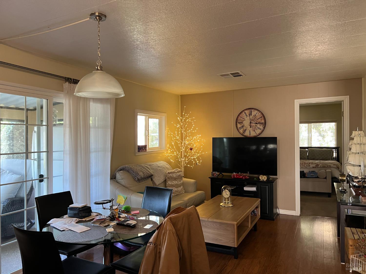 161 Bear Flag Road Sonoma, CA 95476 - Photo 41 of 57 a living room with furniture and a flat screen tv