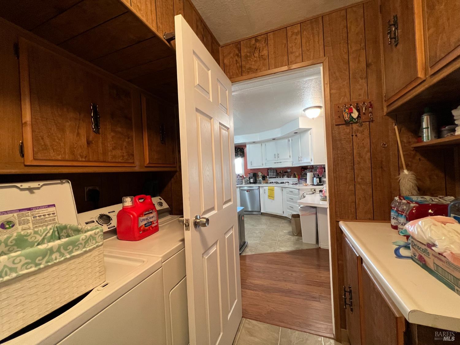 161 Bear Flag Road Sonoma, CA 95476 - Photo 46 of 57 a kitchen with a refrigerator and cabinets