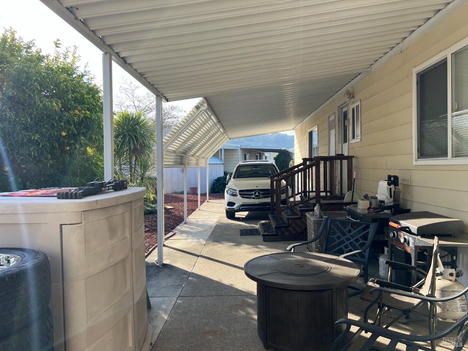 161 Bear Flag Road Sonoma, CA 95476 - Photo 56 of 57 a living room with patio furniture and a grill