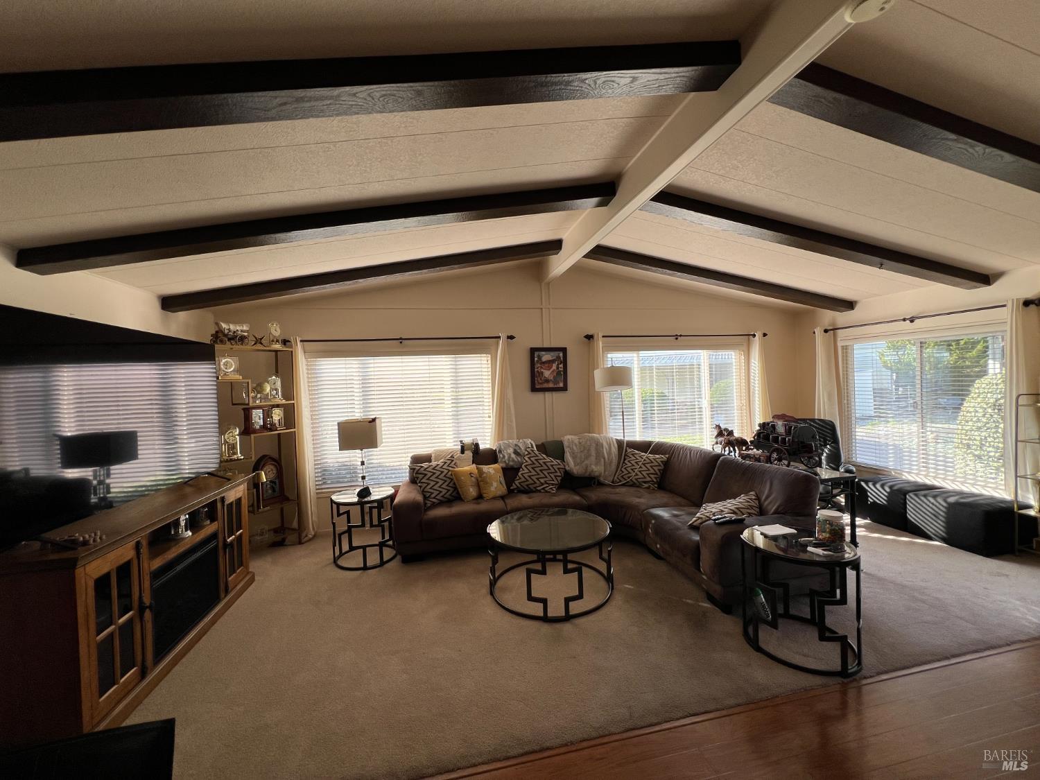 161 Bear Flag Road Sonoma, CA 95476 - Photo 8 of 57 a living room with furniture fireplace and a large window