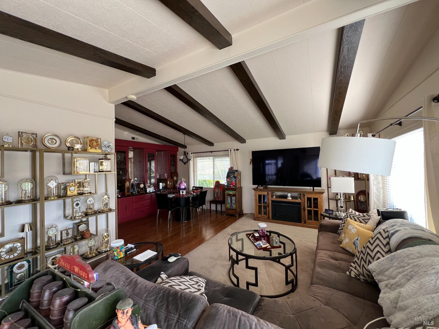161 Bear Flag Road Sonoma, CA 95476 - Photo 10 of 57 a living room with furniture fireplace and a flat screen tv