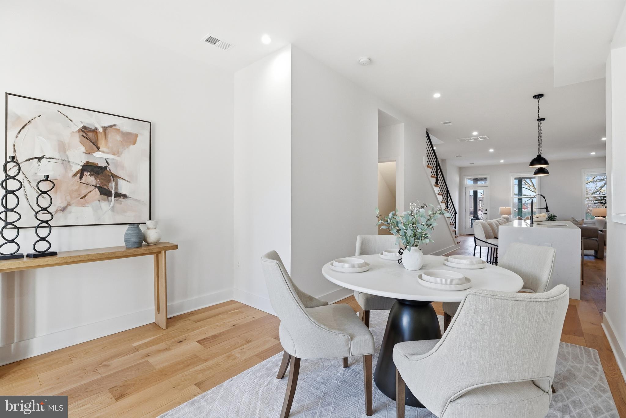2815 North Capitol Street Northeast Washington, DC 20002 - Photo 19 of 87 a view of a dining room with furniture and wooden floor