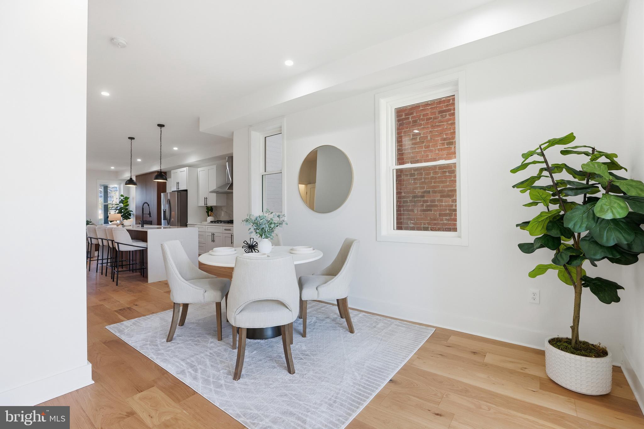 2815 North Capitol Street Northeast Washington, DC 20002 - Photo 21 of 87 a view of a dining room with furniture window and wooden floor