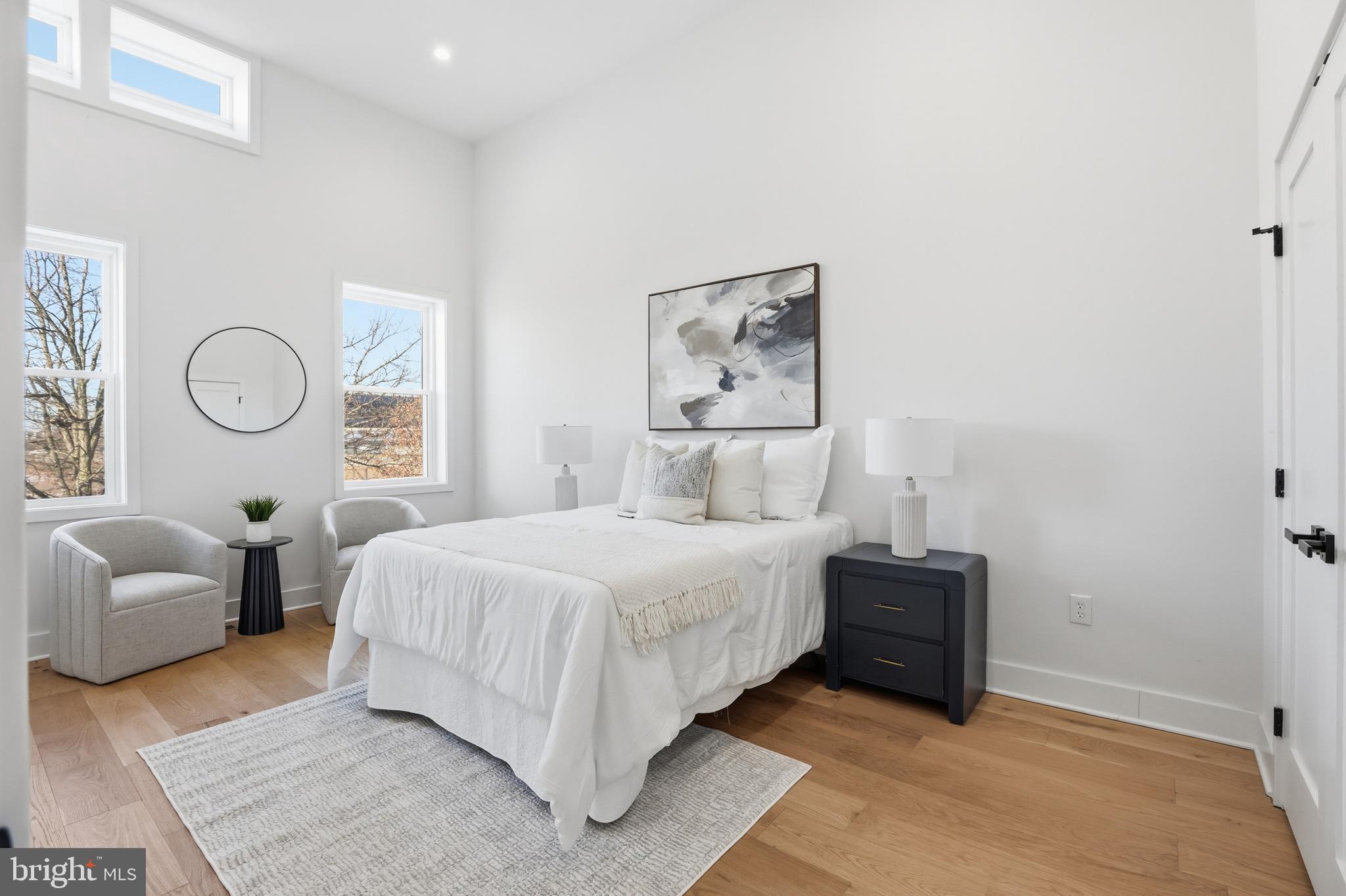 2815 North Capitol Street Northeast Washington, DC 20002 - Photo 32 of 87 a bedroom with a bed couch and window